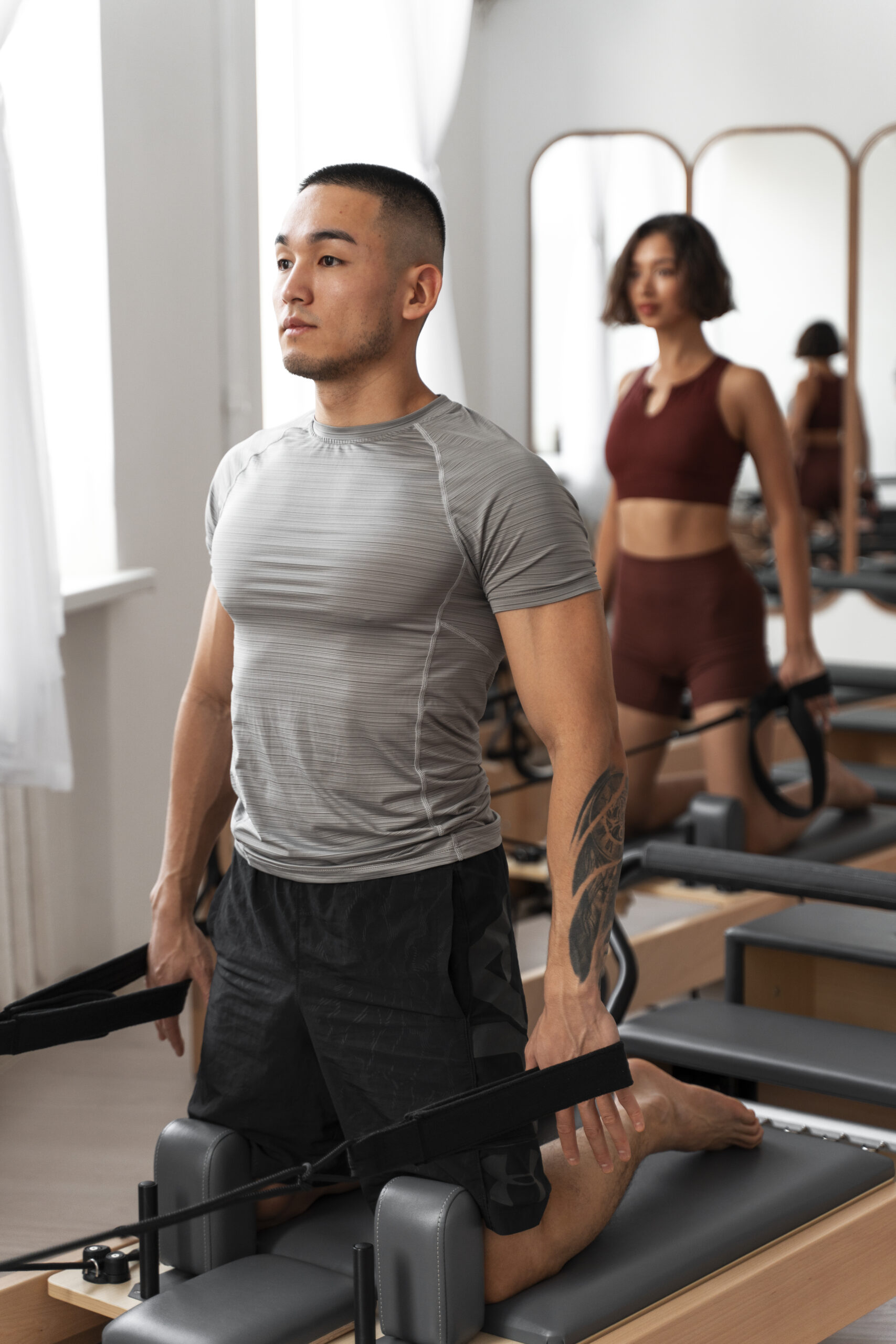 people-taking-pilates-reformer-class (1)